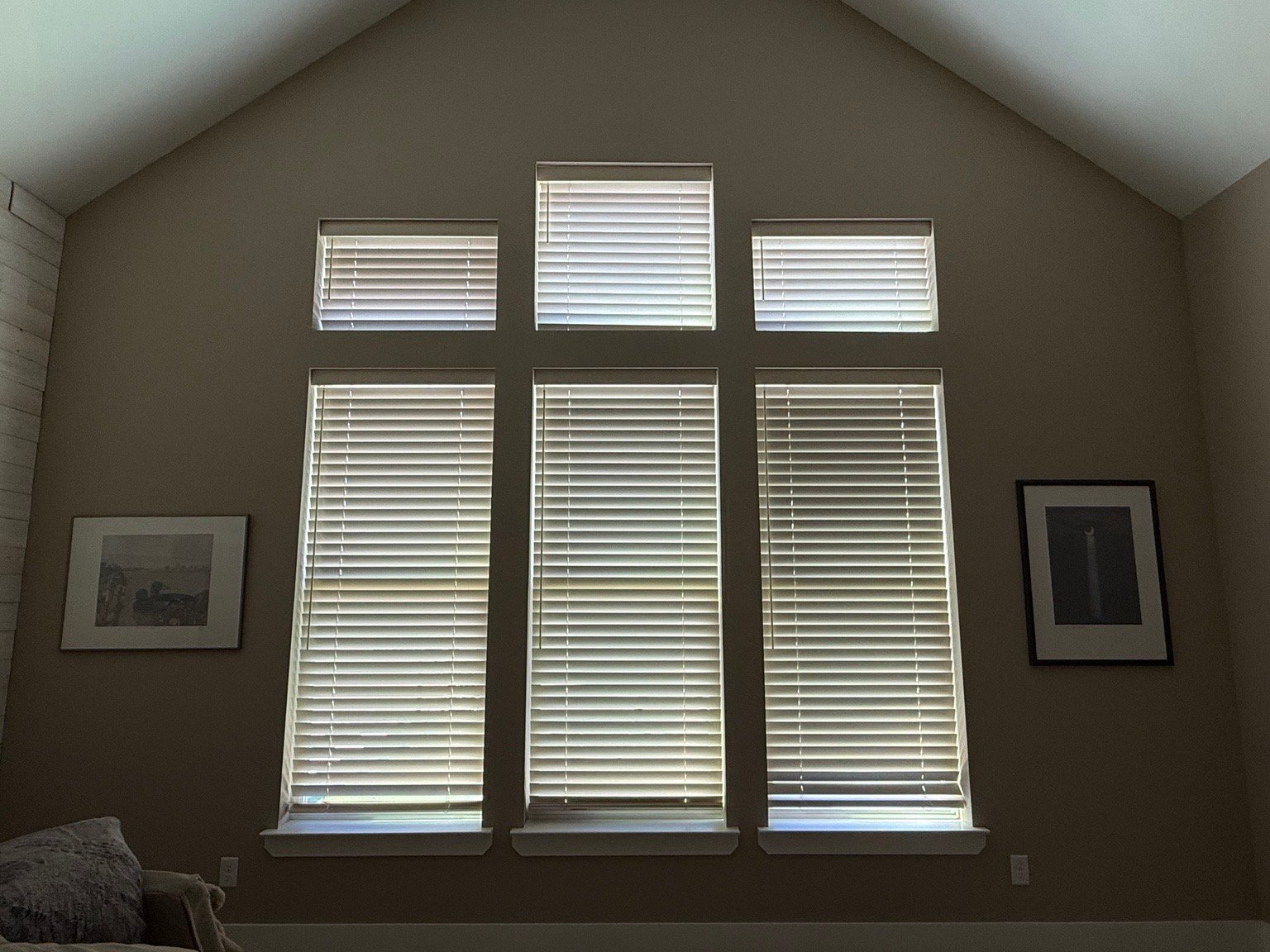 The same room with blinds and curtains drawn. Dim and disconnected, yet still noticeably warm.